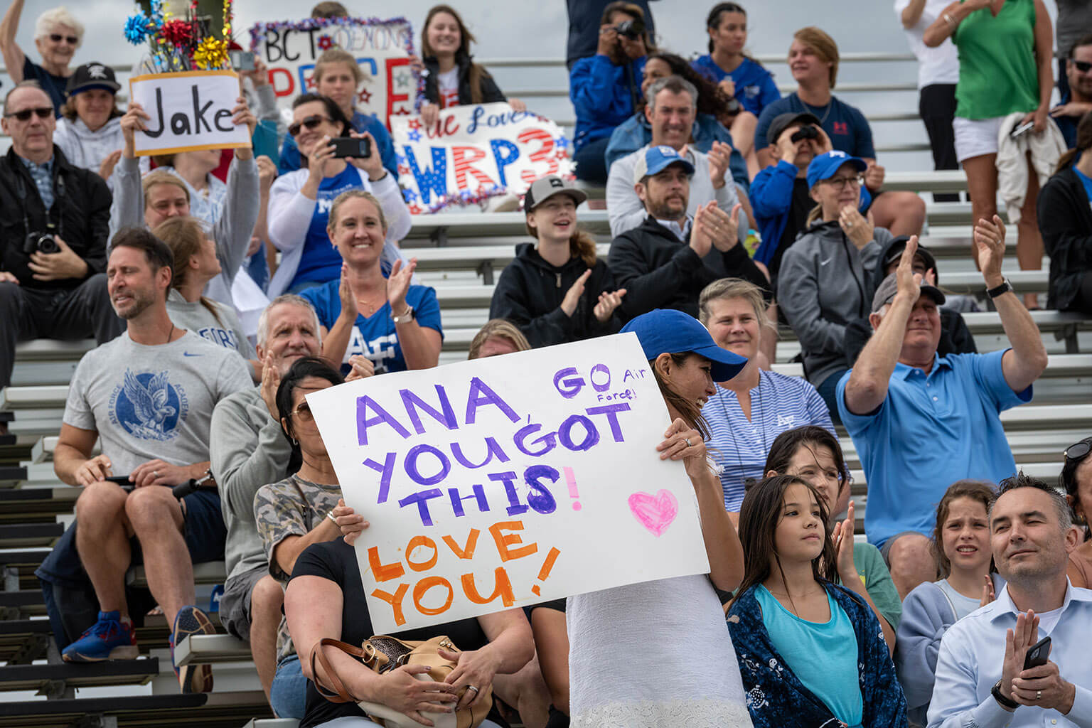 Parents in bleachers at US Air Force Academy