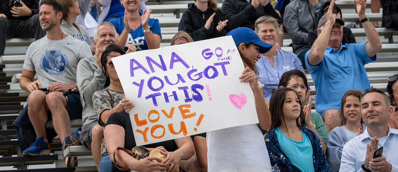 Parents in bleachers at US Air Force Academy