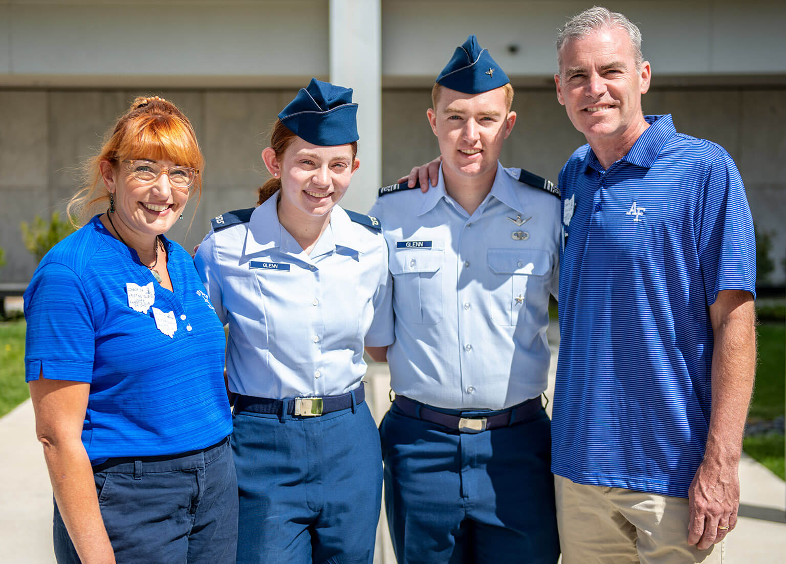 Cadet 4th Class Riley Glenn poses with her brother, Cadet 1st Class Connor Glenn, and their parents, Kristine and Tom Glenn