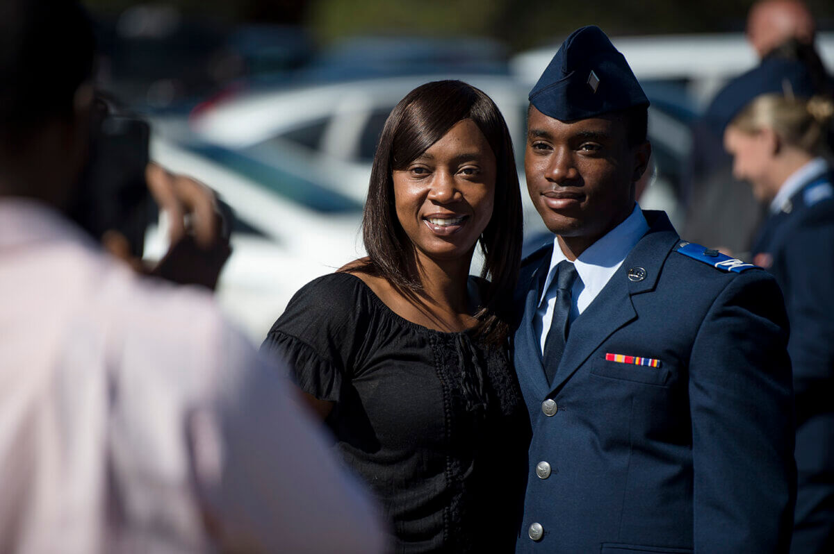 Cadet candidate and mom having picture taken.