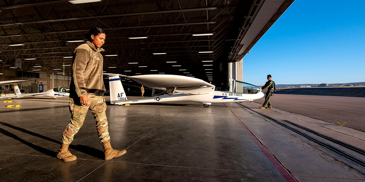 Cadet Candidates working with a sailplane at the U.S. Air Force Academy airfield.
