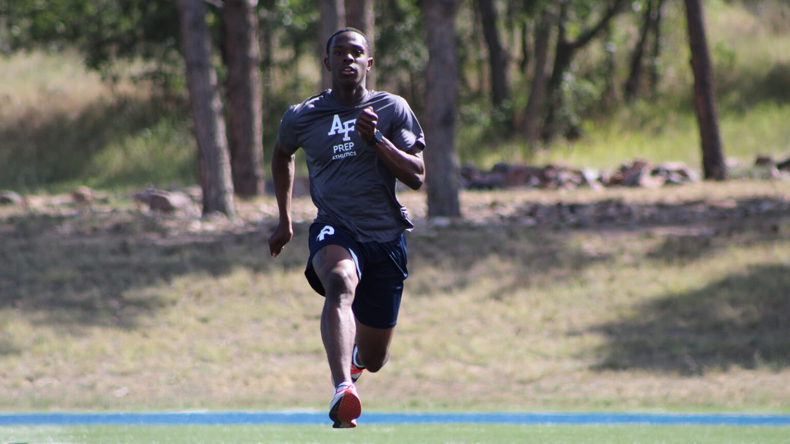 Image of cadet candidate running on track.