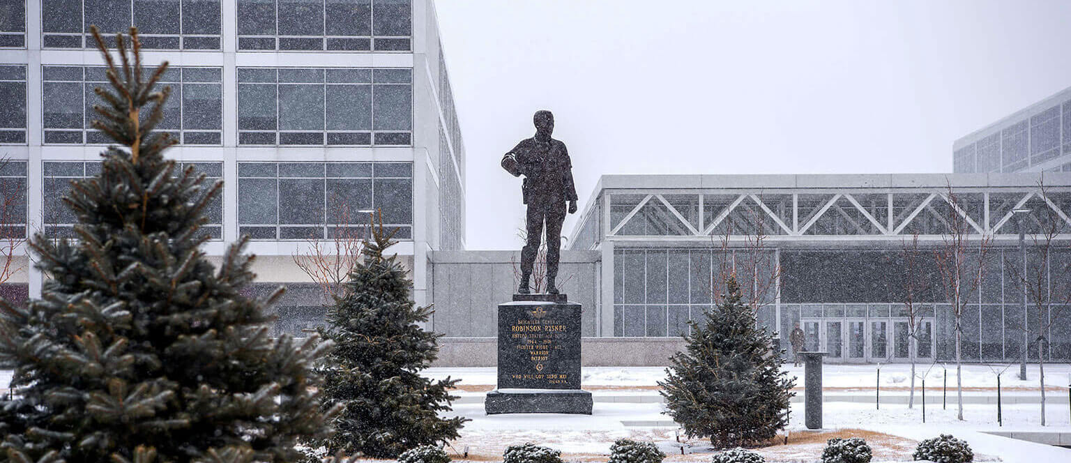 Robinson Risner statue on terrazzo