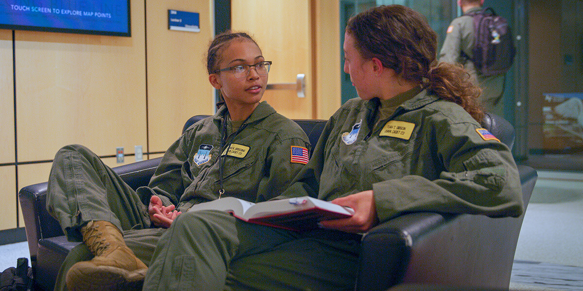Image of cadets talking outside of class.
