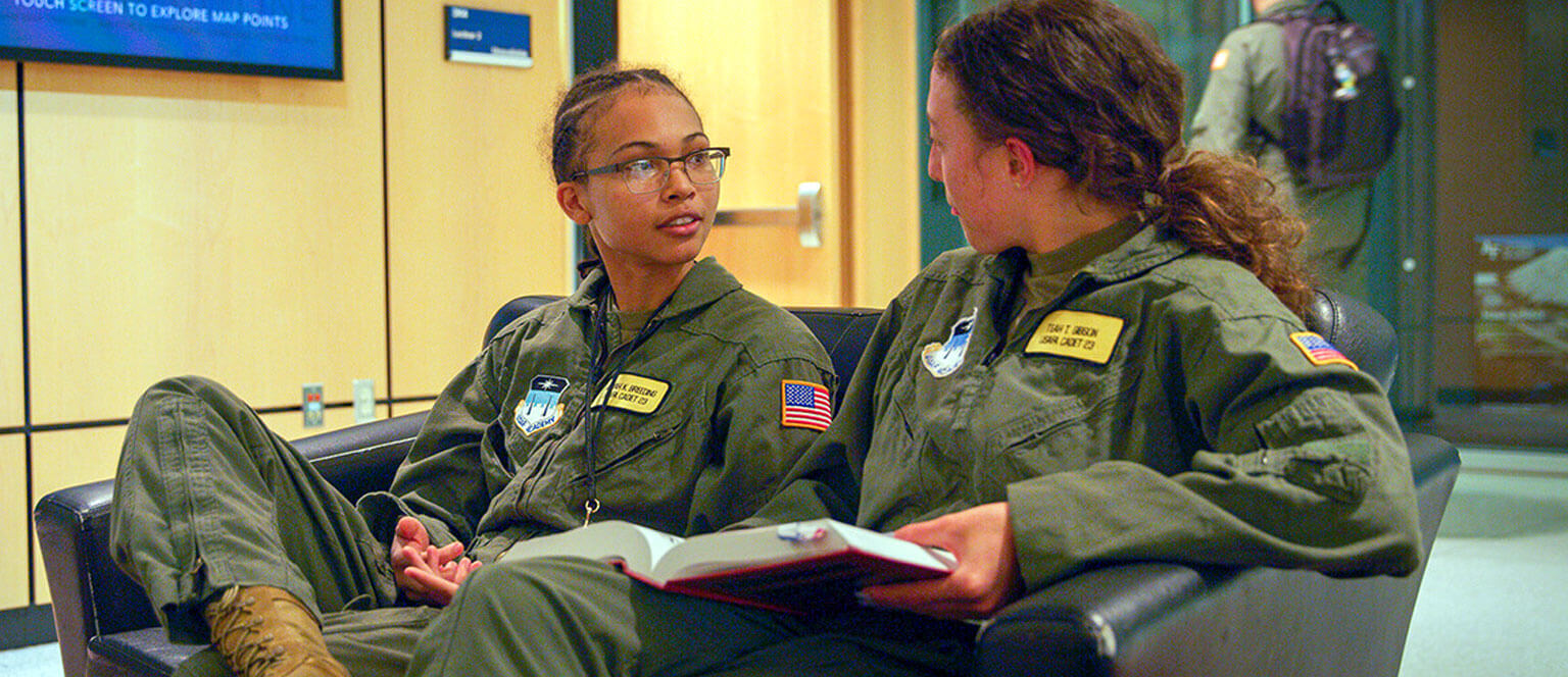 Image of cadets talking outside of class.