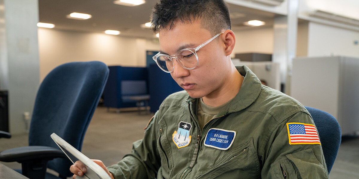 Image of cadet studying.