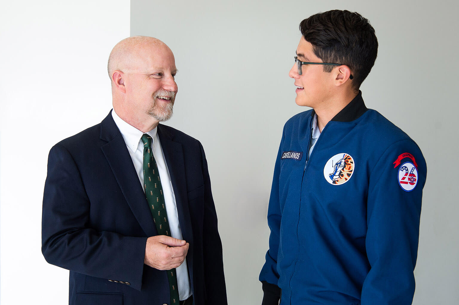 Dr. Pete Swanson, U.S. Air Force Academy associate Spanish professor, talks to Cadet 3rd Class Roy Castellanos