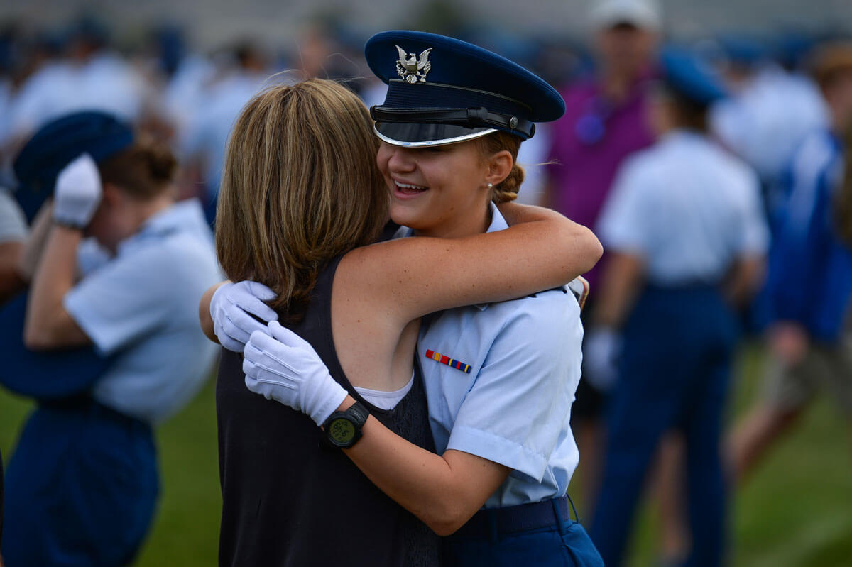 Cadet hugging with parent