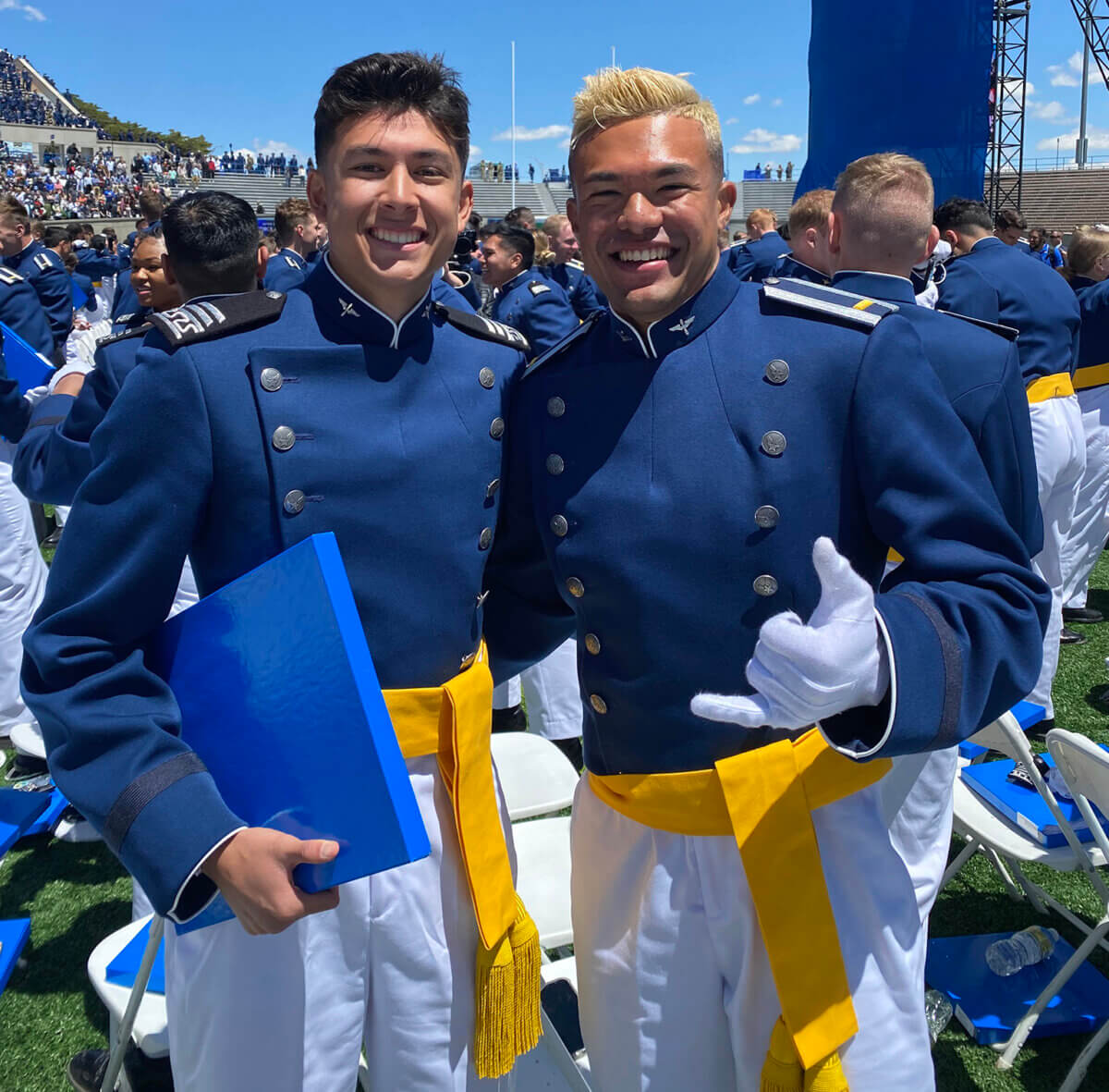 Tristan Trager celebrates receiving his degree during graduation