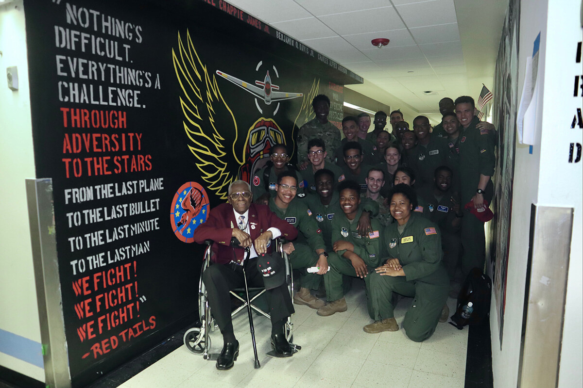 James Harvey with Tuskegee Red Tails mural