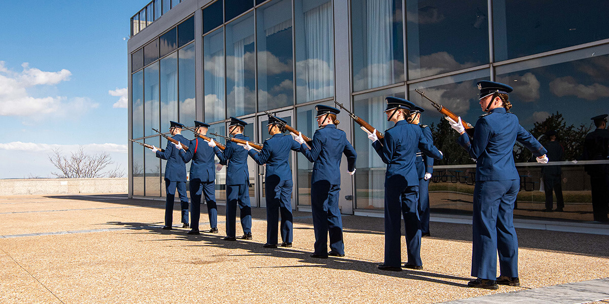 Cadets honor the Tuskegee Airmen with a 21-gun salute