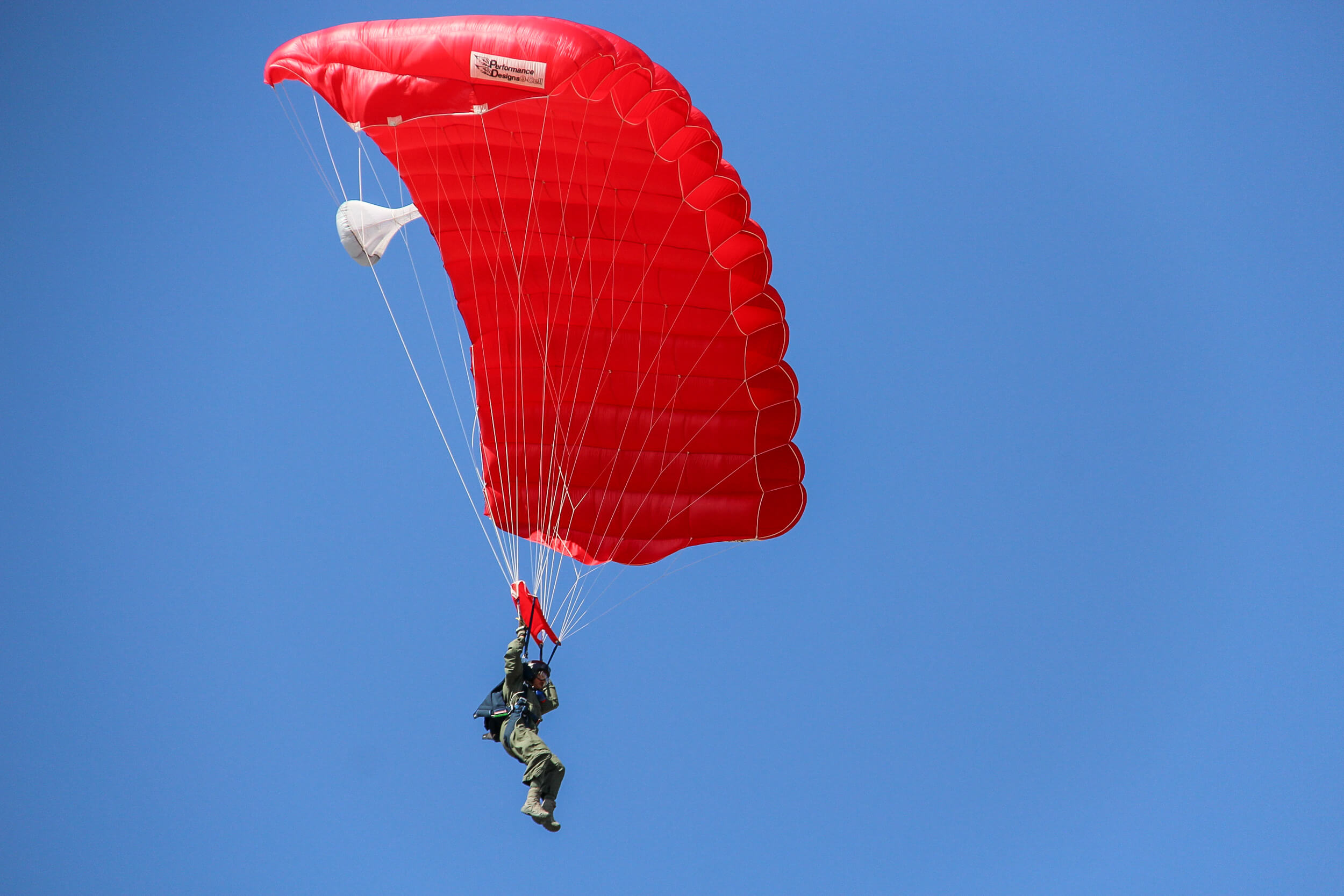 Staff Sgt. Charles Carter parachutes