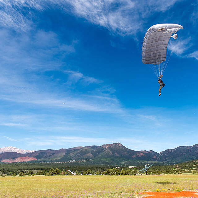 Paratrooper coming in for landing.