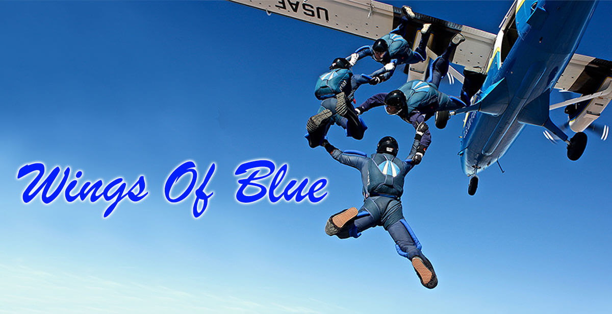Wings of Blue members jumping out of plane