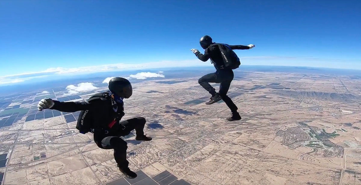 Wings of Blue members performing maneuvers in air