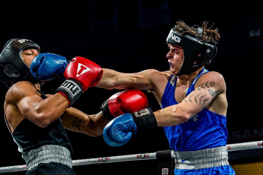 Cadet Don Angelo Piasecki lands a punch onto Cadet Will Winstead