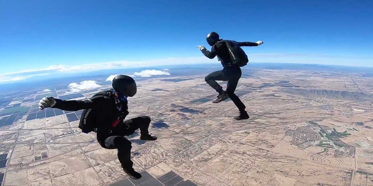 Wings of Blue members doing aerial moves