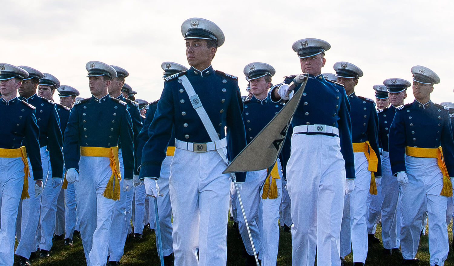 Cadets marching in formation during the Founders' Day Parade at Stillman Field.