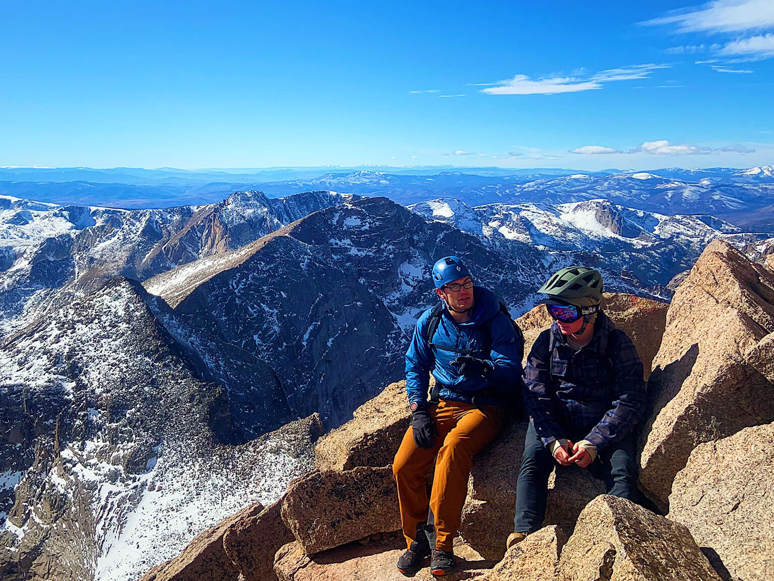 Cadets sitting atop a mountain.