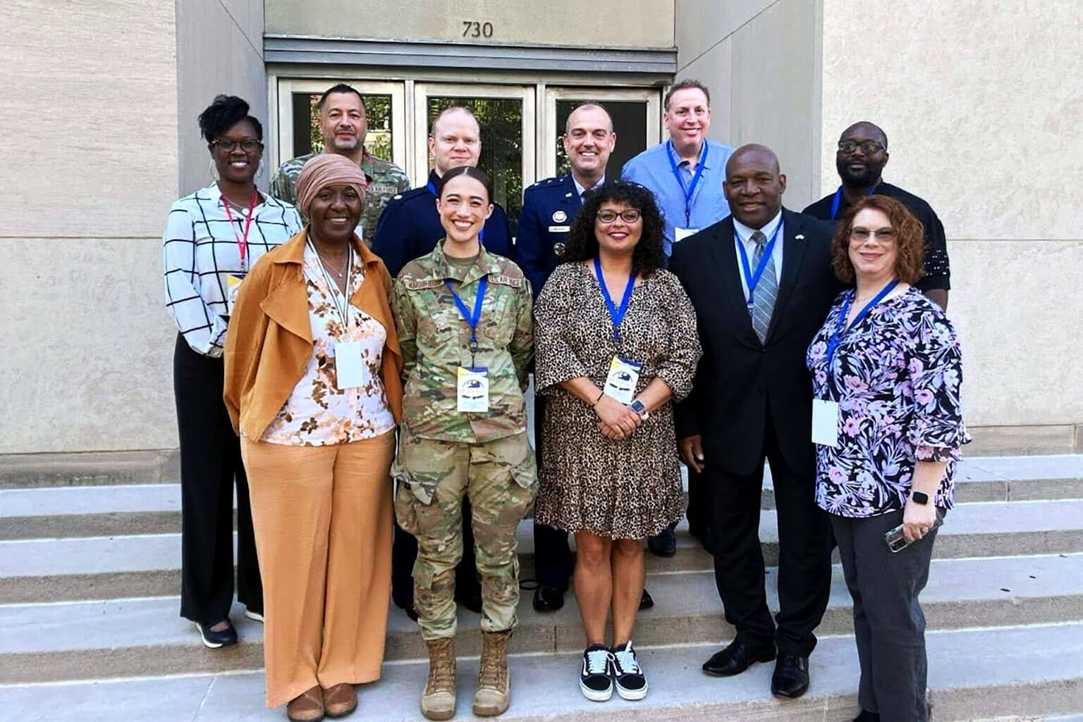 Cadet 2nd Class Kelsey Monaghan-Bergson stands with the Department of the Air Force Barrier Analysis Working Group Disability Action Team in Washington, D.C.