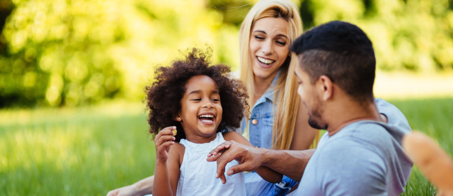 Family enjoying an event at a park.