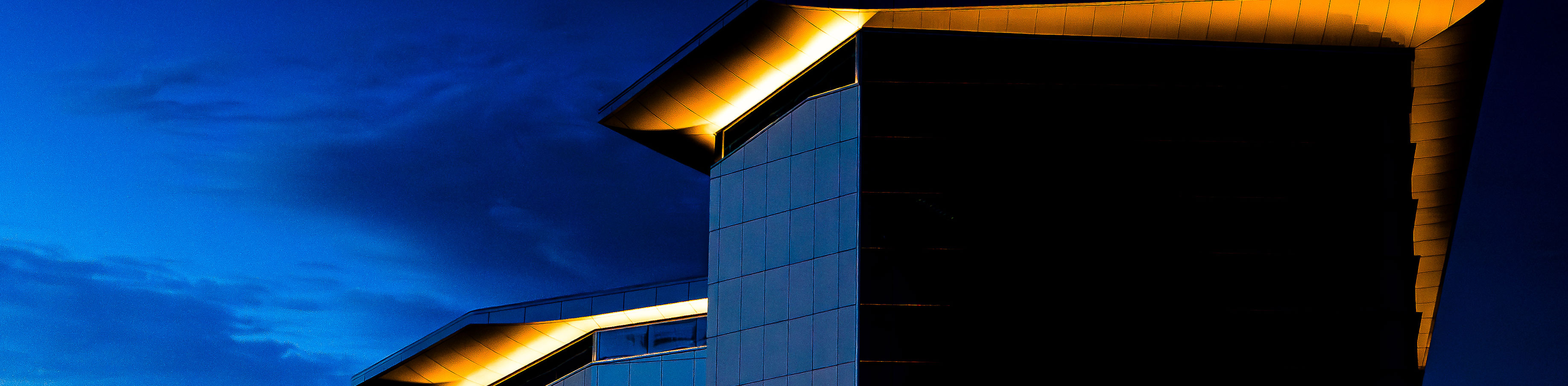 Night view of the Hosmer Visitor Center located at the North Gate of the U.S. Air Force Academy.