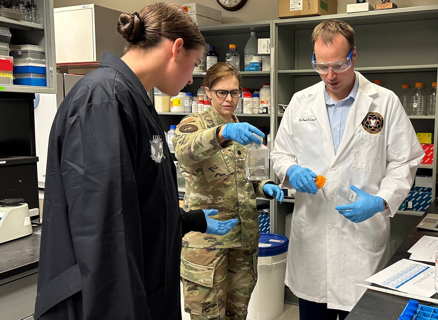 Lt. Col. Kristi McElmurry, Department of Biology, in the center, and Lt. Col. Hershel Lackey