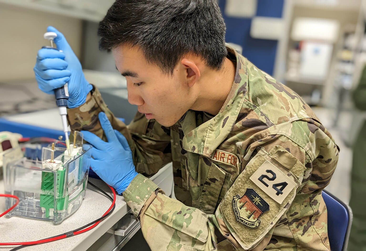 Cadet 1st Class Cosmo Cao conducts an experiment as part of his research.