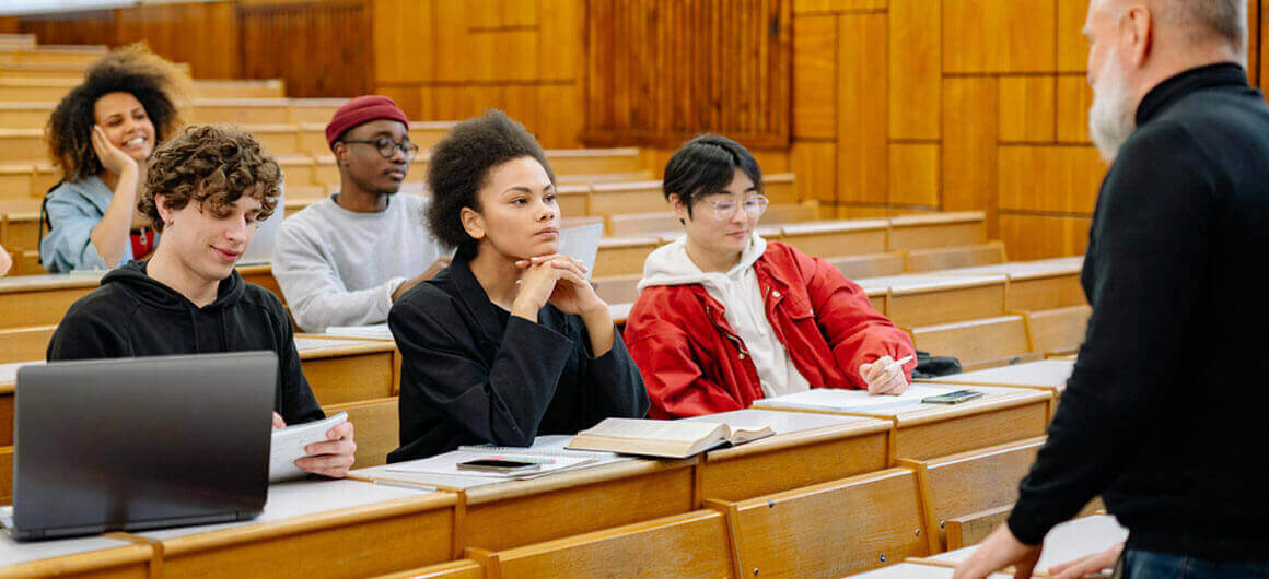 Group of college students in a lecture hall.