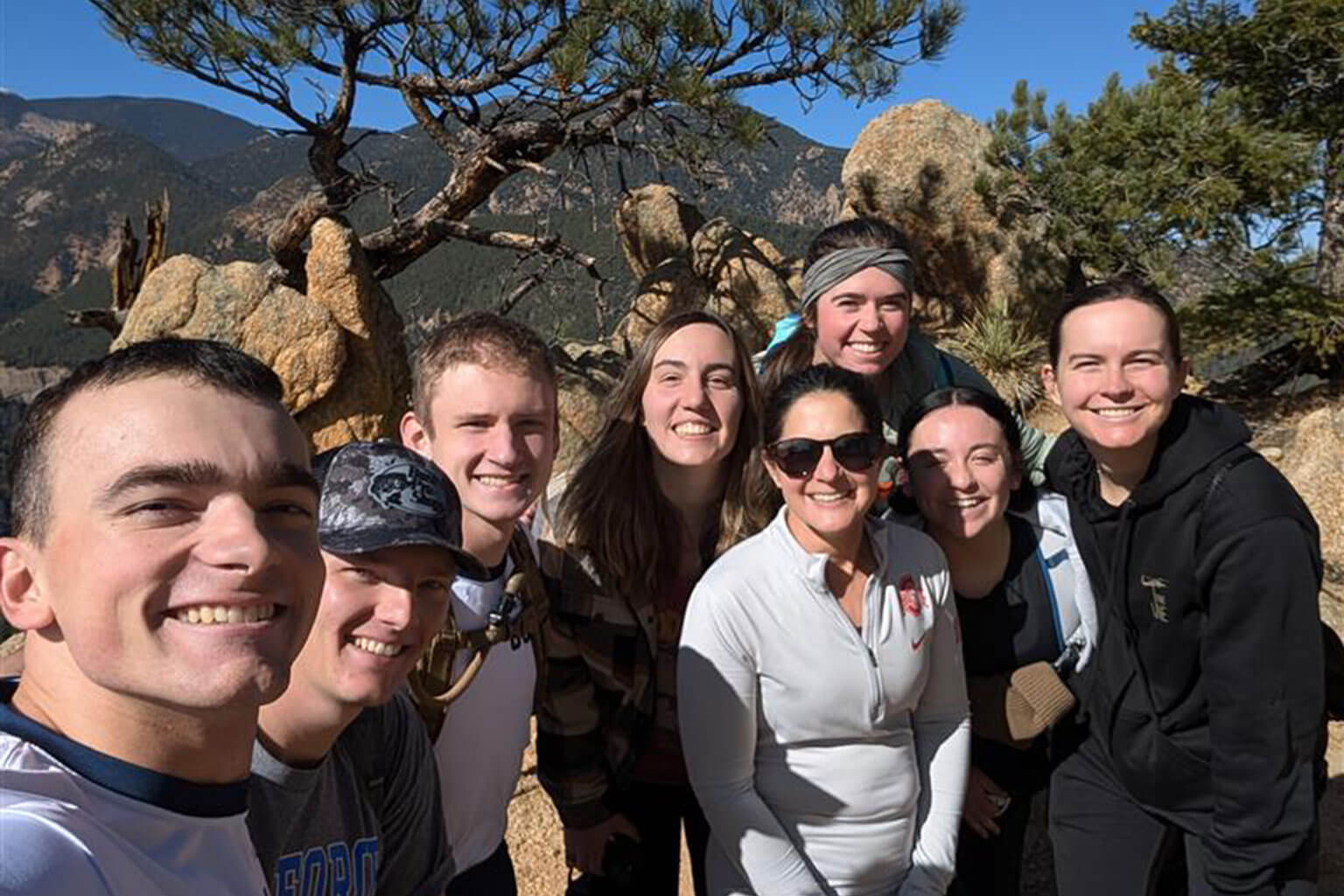 U.S. Air Force Master Sgt. Leona Rodriguez, Cadet Squadron 25 Academy Military Trainer, hikes with her squadron cadets at Mount Muscoco Trail.