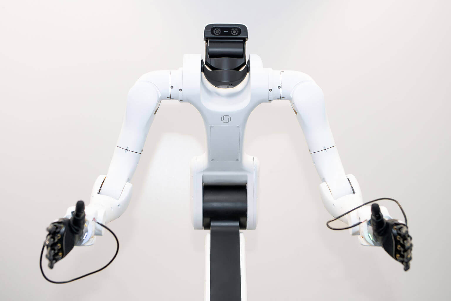 A white robotic arm with dual articulated limbs and cameras at the top, resembles an advanced, humanoid assistant against a neutral background.